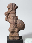 Статуэтка стоящего бога Бэса с коротким мечом и овальным щитом в руках. ГМИИ. I-III вв.